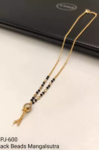 Gold-plated mangalsutra with black beads, long chain, filigree ball pendant with tassel, traditional indian jewellery