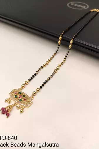 Traditional gold-plated mangalsutra with black beads, multicolour stone pendant and ruby drops