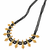 Traditional black beaded mangalsutra necklace, gold-toned, triple strand, lakshmi coin charms, green stone accents