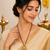 Traditional long mangalsutra with double black bead chain, gold-toned kundan ruby pearl pendant