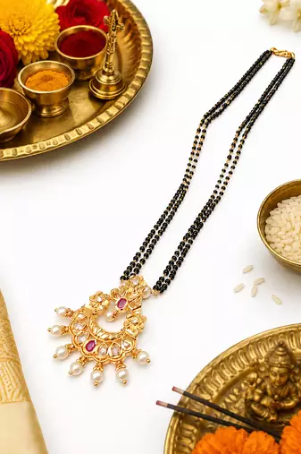 Traditional long mangalsutra with double black bead chain, gold-toned kundan ruby pearl pendant