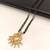 Traditional long mangalsutra with double black bead chain, gold-toned kundan ruby pearl pendant