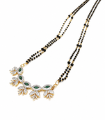 Double strand black bead mangalsutra with green & white cz floral pendant, gold-toned