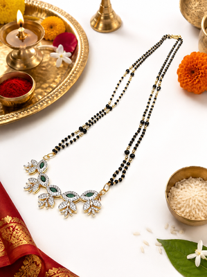 Double strand black bead mangalsutra with green & white cz floral pendant, gold-toned 3