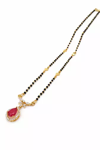 Gold-toned mangalsutra with ruby red teardrop pendant, black bead chain, cz stone accents