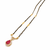 Gold-toned mangalsutra with ruby red teardrop pendant, black bead chain, cz stone accents