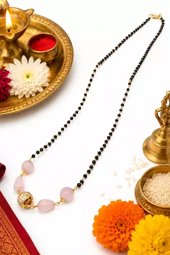 Black bead mangalsutra with rose quartz stones and gold-toned filigree pendant, traditional indian necklace