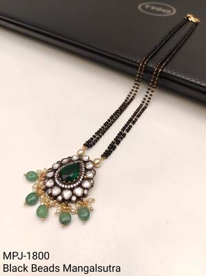 Double strand black bead mangalsutra with kundan pendant, green stone & pearl drops 4