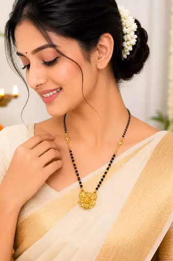 Gold-plated floral pendant mangalsutra, black beaded chain, traditional indian bridal jewellery