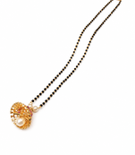 Black beads mangalsutra with gold-toned pearl pendant, traditional indian bridal necklace