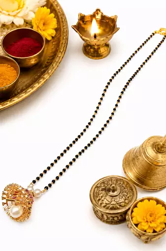 Black beads mangalsutra with gold-toned pearl pendant, traditional indian bridal necklace