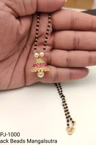 Black beads mangalsutra with gold-toned pearl pendant, traditional indian bridal necklace