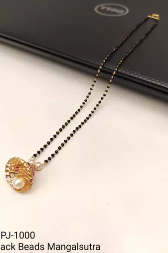 Black beads mangalsutra with gold-toned pearl pendant, traditional indian bridal necklace