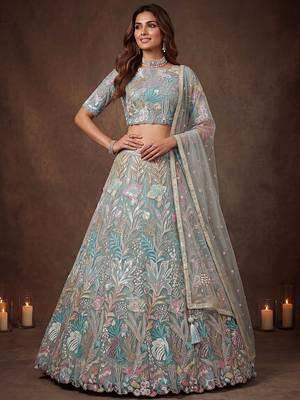 Sparkling Pista Green Embroidered Net Marriage Wear Lehenga Choli 1
