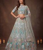 Sparkling Pista Green Embroidered Net Marriage Wear Lehenga Choli