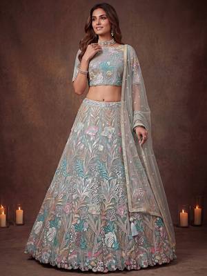Sparkling Pista Green Embroidered Net Marriage Wear Lehenga Choli 2