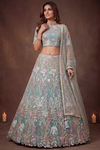 Sparkling Pista Green Embroidered Net Marriage Wear Lehenga Choli