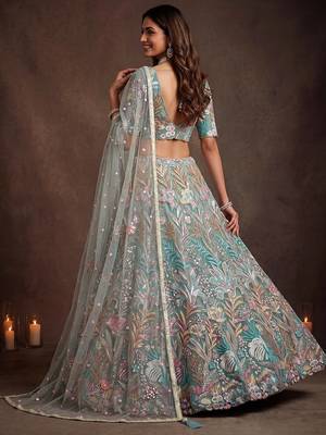 Sparkling Pista Green Embroidered Net Marriage Wear Lehenga Choli 4