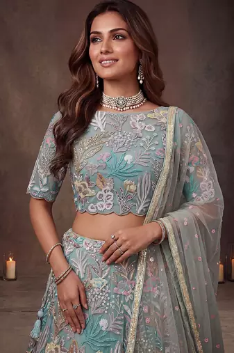Sparkling Pista Green Embroidered Net Marriage Wear Lehenga Choli