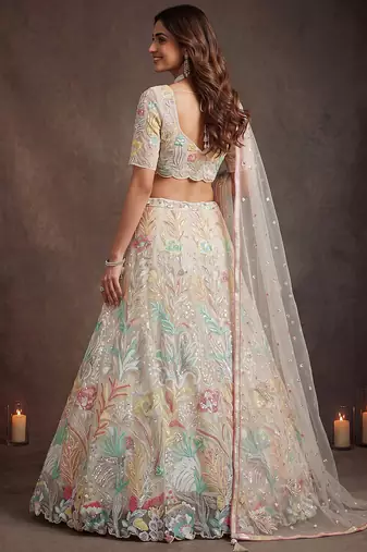 Majestic Off-White Sequins Net Party Wear Lehenga Choli