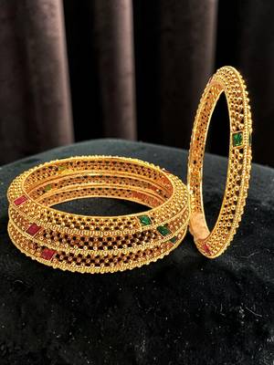 Set of 4 gold plated thushi style bangles 1