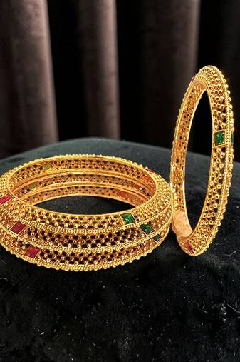 Set of 4 gold plated thushi style bangles