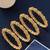 Set of 4 gold plated filigree carved style bangles