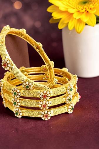 Gold plated set of 4 floral beaded bangle set