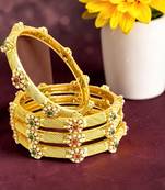 Gold plated set of 4 floral beaded bangle set