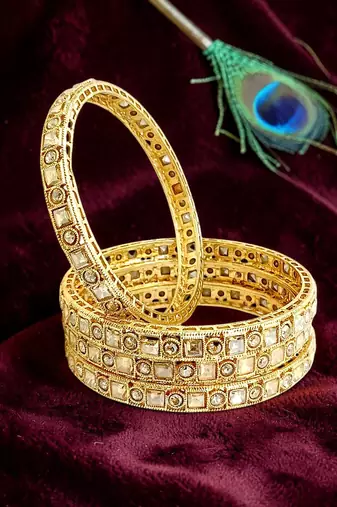 Set of 4 gold plated cz fancy bangles