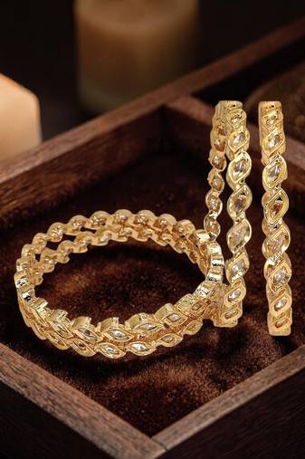 Set of 4 gold plated moissanite bangles