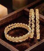 Set of 4 gold plated moissanite bangles