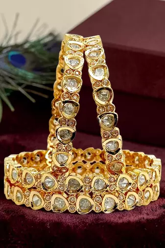 Set of 4  gold plated moissanite bangles