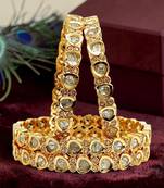 Set of 4  gold plated moissanite bangles