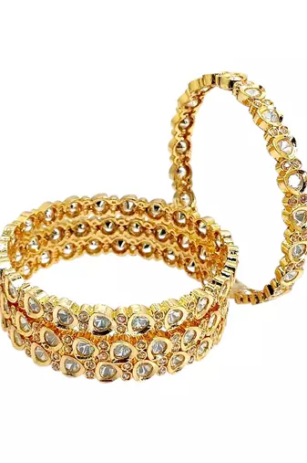 Set of 4  gold plated moissanite bangles