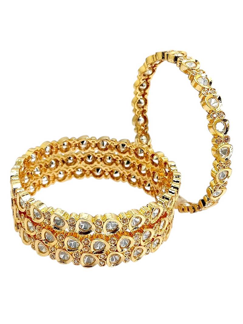 Set of 4  gold plated moissanite bangles