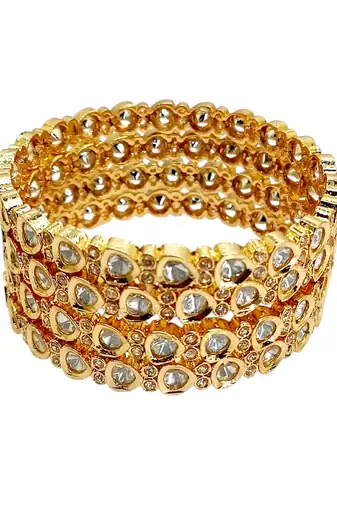 Set of 4  gold plated moissanite bangles