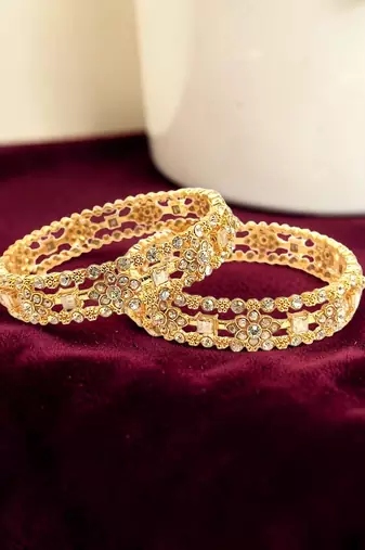 Gold plated set of 2 floral motif cz bangle set