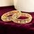 Gold plated set of 2 floral motif cz bangle set