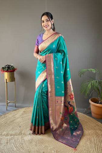 Rama green color silk blend saree with rich contrast weaving pallu & border and beautiful buttis