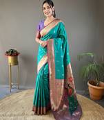 Rama green color silk blend saree with rich contrast weaving pallu & border and beautiful buttis