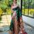 Women's green woven silk blend saree with blouse piece