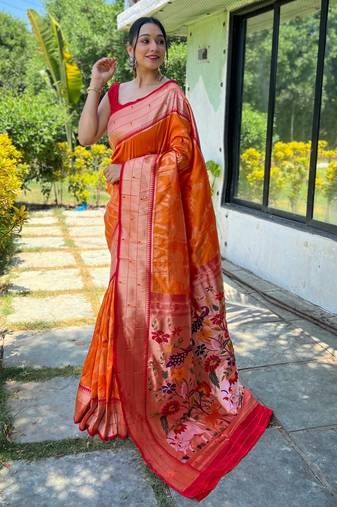 Women's orange woven silk blend saree with blouse piece