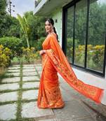 Orange silk blend saree with meenakari motifs