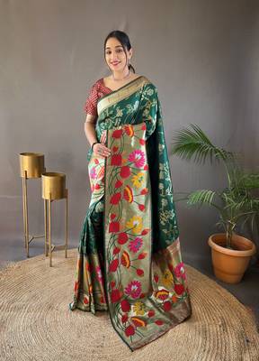 Green silk blend saree with rich weaved heavy pallu & 3d traditional design with gold and silver zari 1