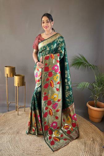 Green silk blend saree with rich weaved heavy pallu & 3d traditional design with gold and silver zari