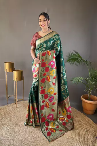 Green silk blend saree with rich weaved heavy pallu & 3d traditional design with gold and silver zari