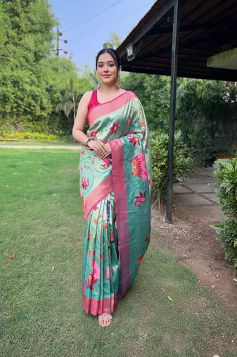 Traditional blue silk blend saree with vibrant floral motifs