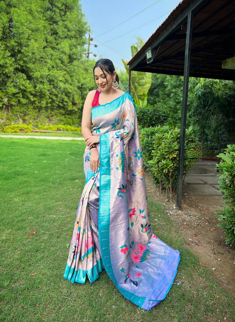 Traditional lavender silk blend saree with vibrant floral motifs
