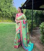 Traditional lemon green silk blend saree with vibrant floral motifs